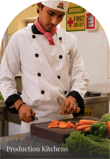 Chef preparing food in a production kitchen